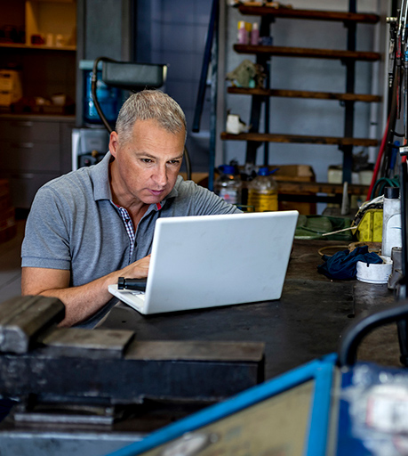 Small business owner working in his shop