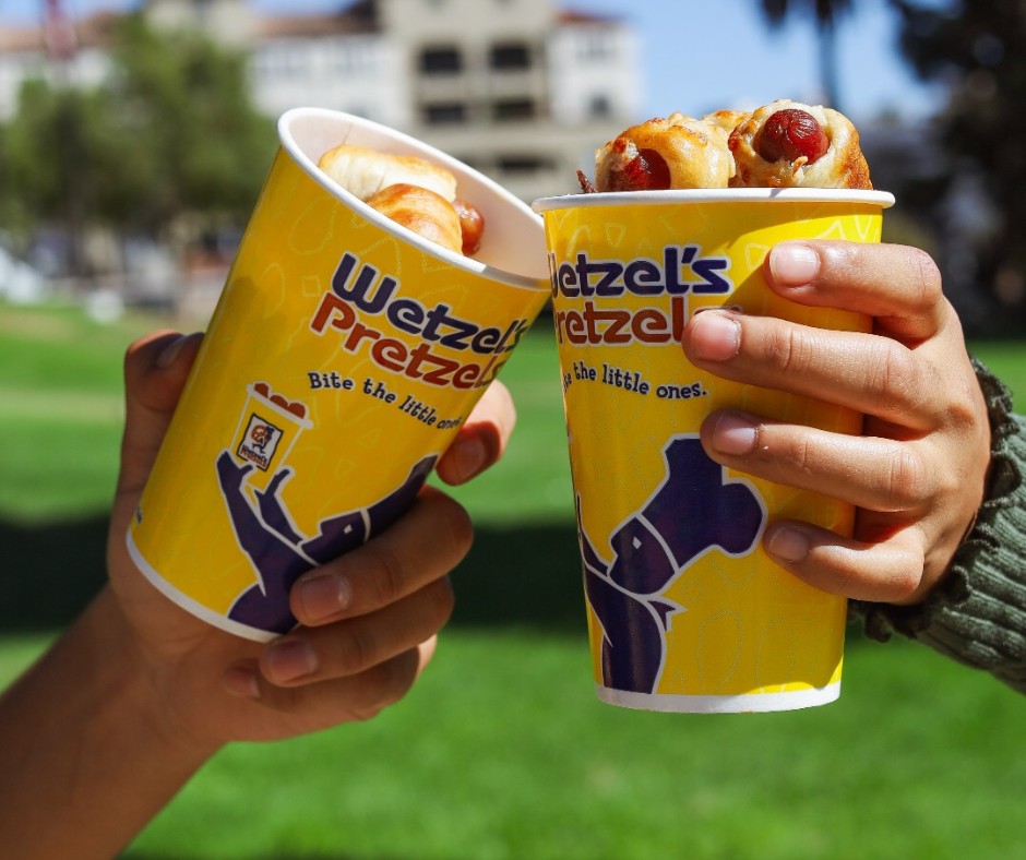 Wetzel's Pretzel cups cheerings with pretzel bits inside the cups