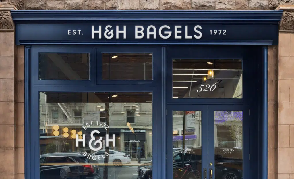 H&H bagels storefront with blue accents on the building