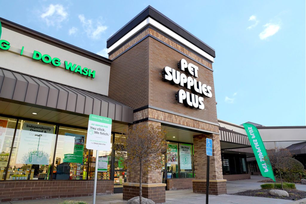 Pet Supplies Plus franchise storefront with red brick and white lettering